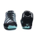 Back heel view of the KURU CHICANE Women's Sneaker in Black-Delirium.