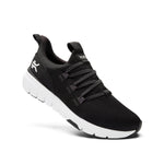 Back heel view of the KURU FLEX Slip-On Women's Sneaker in Jet Black-Bright White.