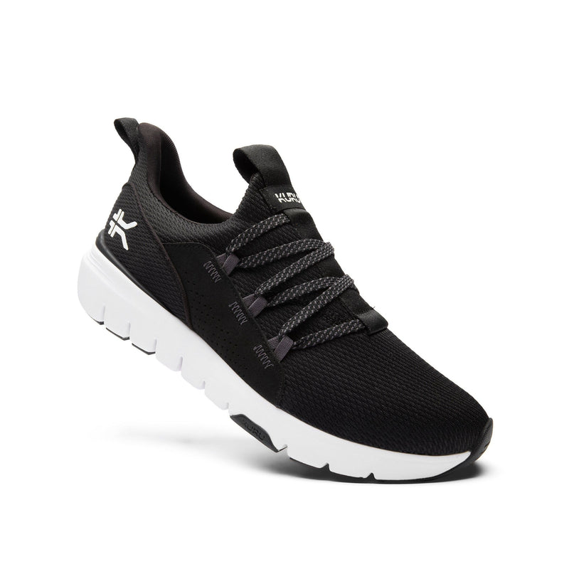 Back heel view of the KURU FLEX Slip-On Women's Sneaker in Jet Black-Bright White.