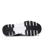 Back heel view of the KURU FLEX Slip-On Men's Sneaker in Jet Black-Bright White.