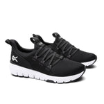 Angled profile view of the KURU FLEX Slip-On Men's Sneaker in Jet Black-Bright White.