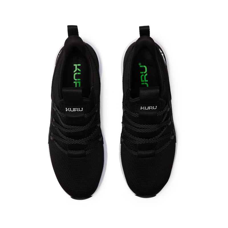 Pair of KURU FLEX Slip-On Men's Sneaker in Jet Black-Bright White, angled view.