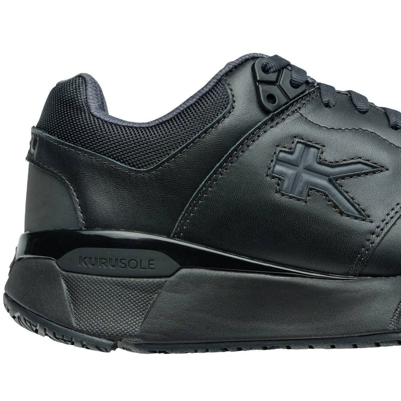 Close-up of the heel cup on the KURU KINETIC 2 WIDE Men's Sneaker in Smokestack Black.