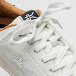 Close-up of the upper material on the KURU ROAM Women's Sneaker in Bright White-Jet Black.