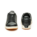Back heel view of the KURU ROAM Men's Sneaker in Jet Black-Bright White.