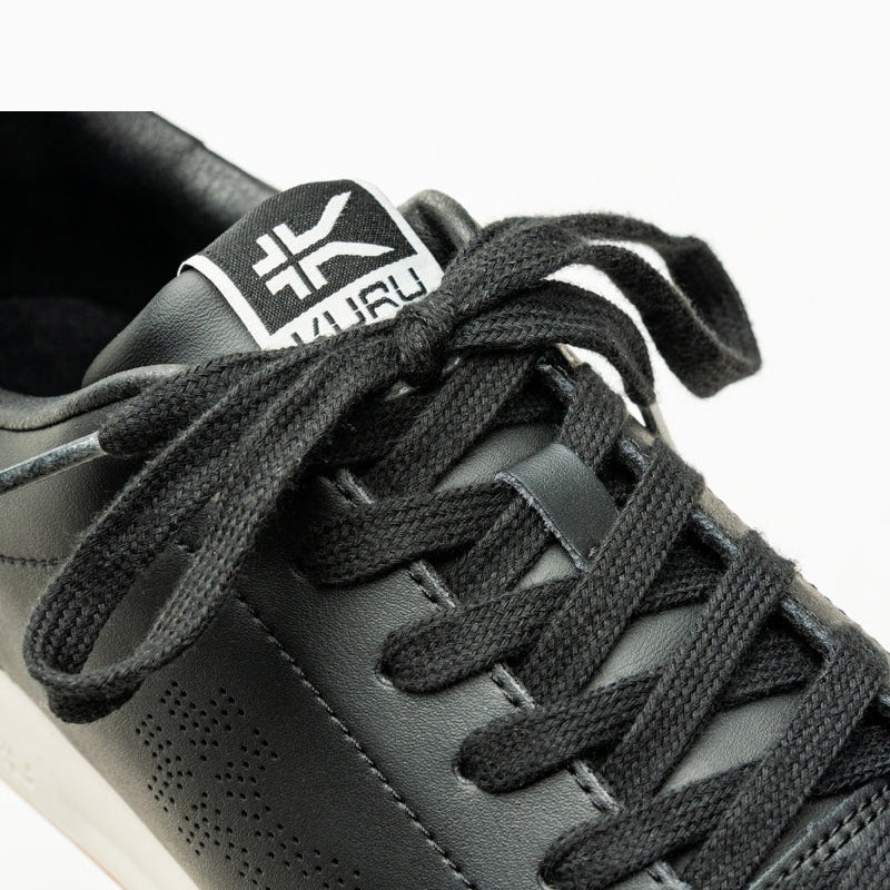 Close-up of the upper material on the KURU ROAM Men's Sneaker in Jet Black-Bright White.
