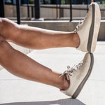 Person wearing the KURU ROAM Women's Sneaker.