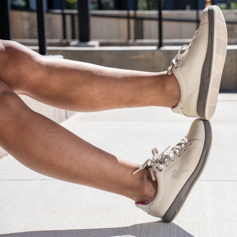Person wearing the KURU ROAM Women's Sneaker.