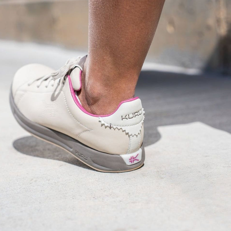 Pair of KURU ROAM Women's Sneaker in Sand-Pebble, angled view.