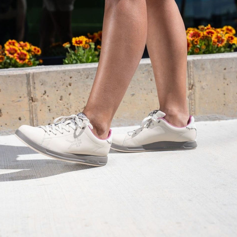 Pair of KURU ROAM Women's Sneaker in Sand-Pebble, angled view.