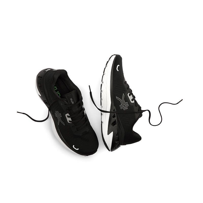 Outsole view of the KURU TRIPLE MAX Ion Men's Sneaker in Jet Black-Storm Gray, showing the KURUSOLE tread.