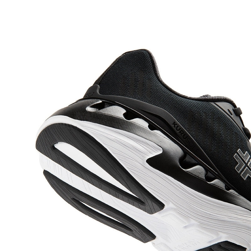 Pair of KURU TRIPLE MAX Ion Men's Sneaker in Jet Black-Storm Gray, angled view.