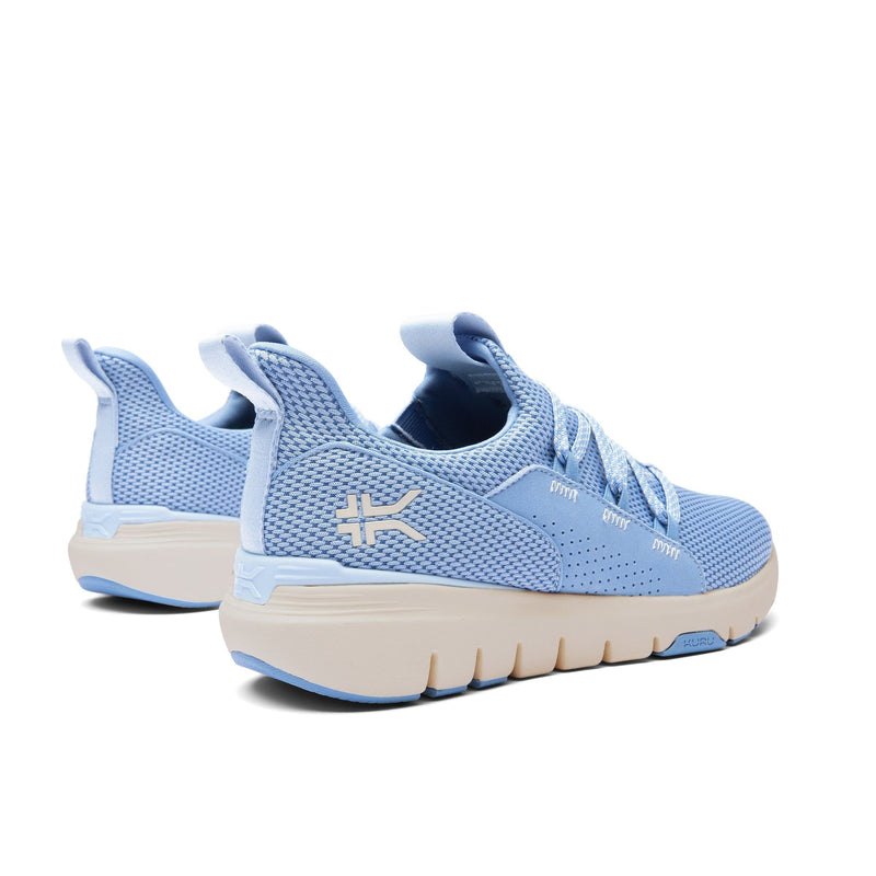 Angled profile view of the KURU FLEX Slip-On Women's Sneaker in Blue Fog-Sand.