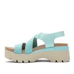 Inner side view of the KURU LOMA Women's Sandal in Aqua Spritzer.