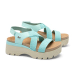 Pair of KURU LOMA Women's Sandal in Aqua Spritzer, angled view.