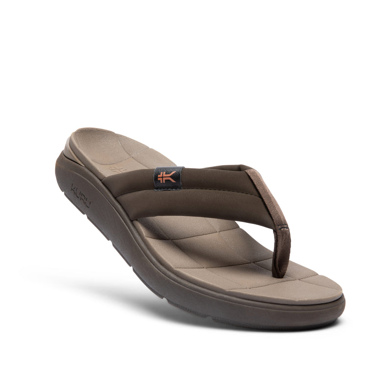 Angled profile view of the KURU MOMENT Flip Men's Flip-Flop in Espresso Brown-Warmstone.