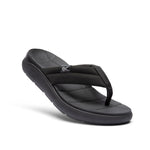 Angled profile view of the KURU MOMENT Flip Women's Flip-Flop in Jet Black.