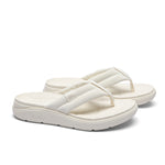 Pair of KURU MOMENT Flip Women's Flip-Flop in Ecru, angled view.