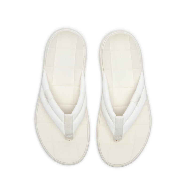 Top-down view of the KURU MOMENT Flip Women's Flip-Flop in Ecru.