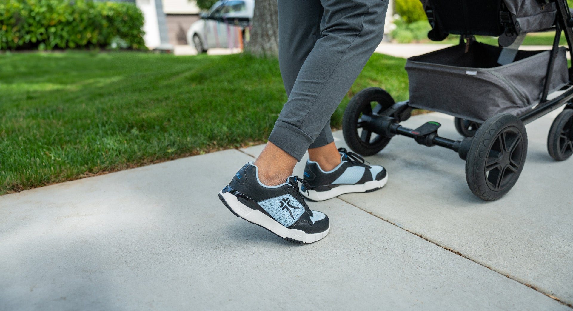 A mom enjoying comfortable footwear, featured in KURU's Mother's Day gift guide.