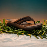 Angled profile view of the KURU MOMENT Flip Men's Flip-Flop in Espresso Brown-Warmstone.