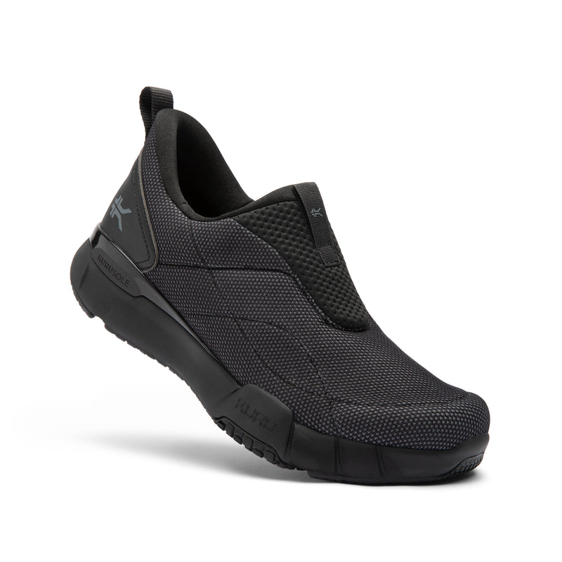 Angled profile view of the KURU QUANTUM 2 Slip-On Men's Slip-On Sneaker in Jet Black-Lead Gray.