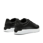 Close-up of the heel cup on the KURU ROAM 2 Unisex Sneaker in Jet Black-Bright White.