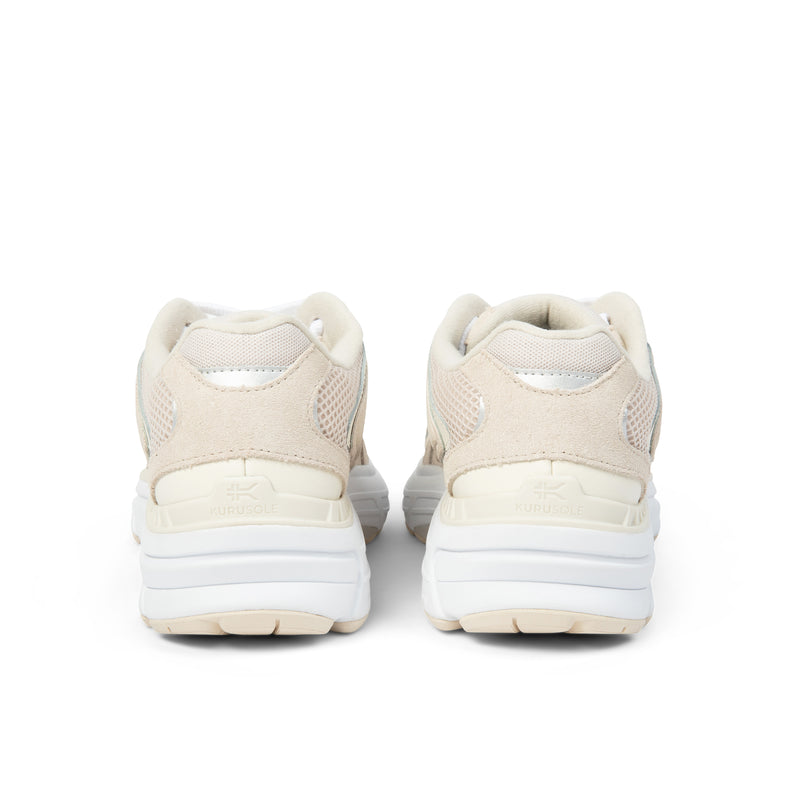 Back heel view of the KURU SURGE Unisex Sneaker in Ashwood-Bright White.