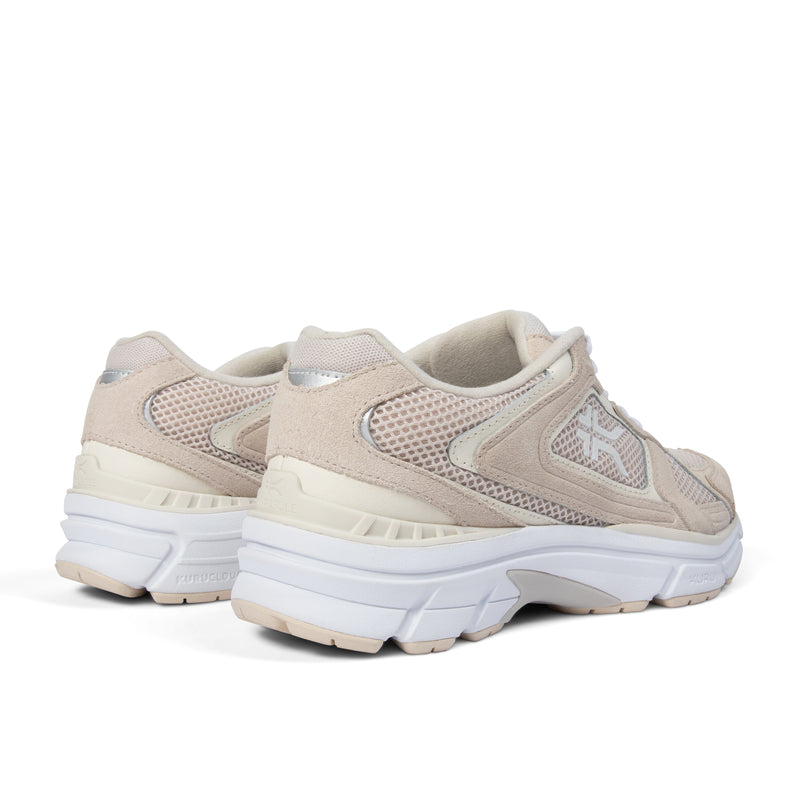 Close-up of the heel cup on the KURU SURGE Unisex Sneaker in Ashwood-Bright White.