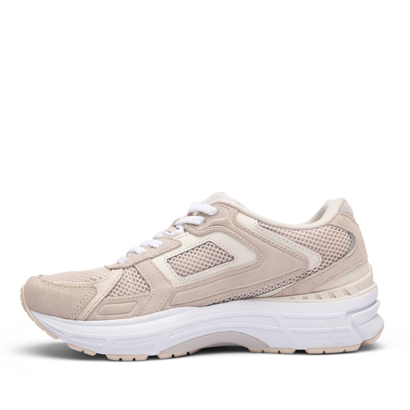 Inner side view of the KURU SURGE Unisex Sneaker in Ashwood-Bright White.