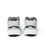 Back heel view of the KURU SURGE Unisex Sneaker in Dove Gray-Bright White.