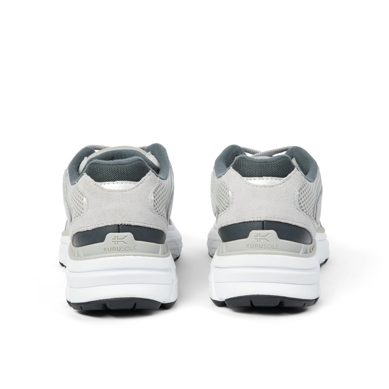 Back heel view of the KURU SURGE Unisex Sneaker in Dove Gray-Bright White.