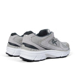 Close-up of the heel cup on the KURU SURGE Unisex Sneaker in Dove Gray-Bright White.
