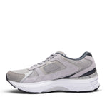 Inner side view of the KURU SURGE Unisex Sneaker in Dove Gray-Bright White.