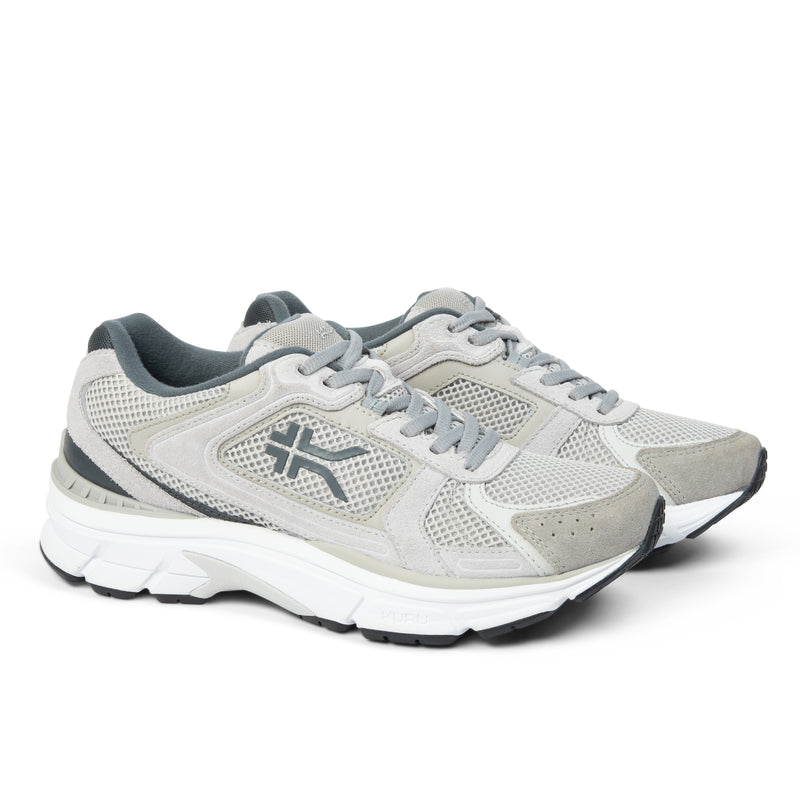 Pair of KURU SURGE Unisex Sneaker in Dove Gray-Bright White, angled view.