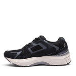 Inner side view of the KURU SURGE Unisex Sneaker in Jet Black-Bone Gray.