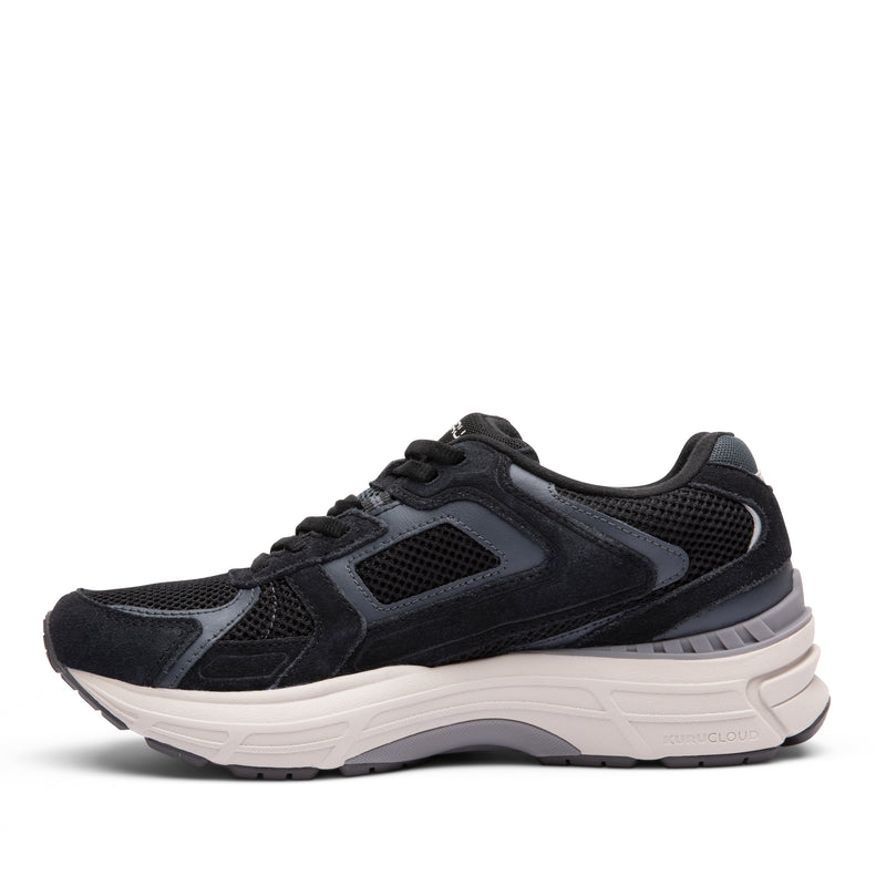 Inner side view of the KURU SURGE Unisex Sneaker in Jet Black-Bone Gray.