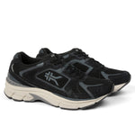 Pair of KURU SURGE Unisex Sneaker in Jet Black-Bone Gray, angled view.
