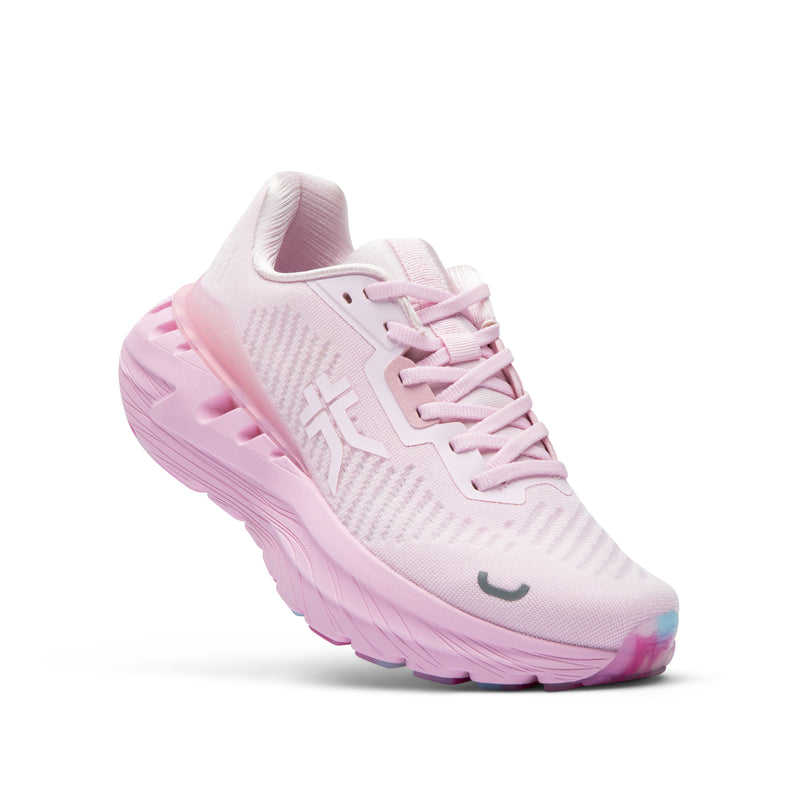 Angled profile view of the KURU TRIPLE MAX Ion Women's Sneaker in Watermelon Slush.