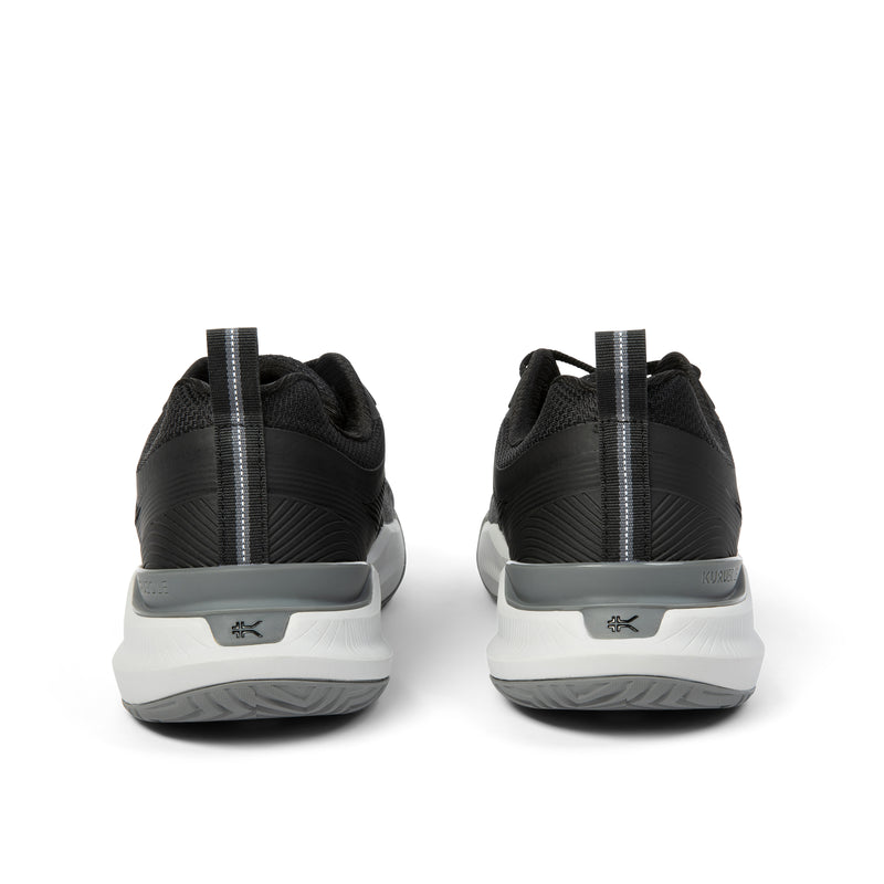 Back heel view of the KURU VELOCITY Men's Sneaker in Jet Black-Charcoal Gray.