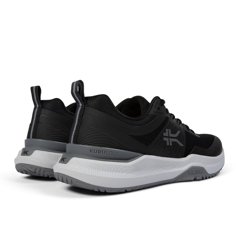 Close-up of the heel cup on the KURU VELOCITY Men's Sneaker in Jet Black-Charcoal Gray.