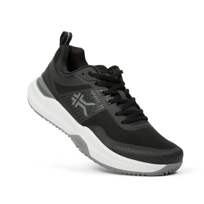 Angled profile view of the KURU VELOCITY Men's Sneaker in Jet Black-Charcoal Gray.