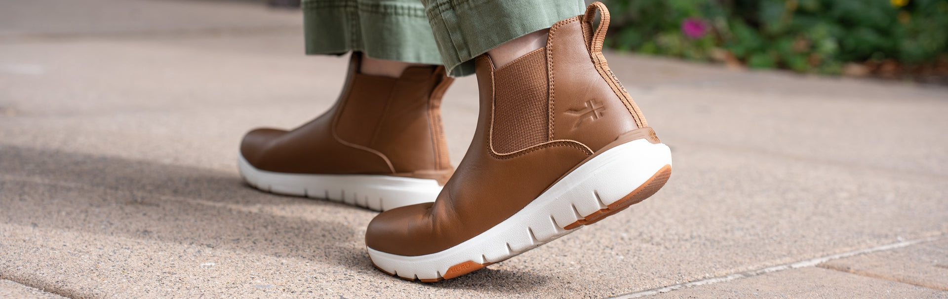 KURU footwear collection in chestnut brown and white, perfect for fall activities.