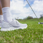 Back heel view of the KURU DRIVE Golf Unisex Golf Shoe in Dove Gray-Bright White.