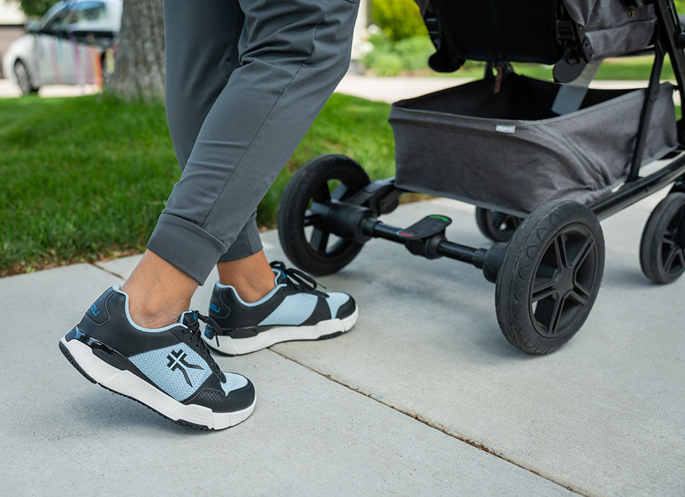 A mother enjoying comfortable KURU footwear, featured in the KURU Mother's Day gift guide.